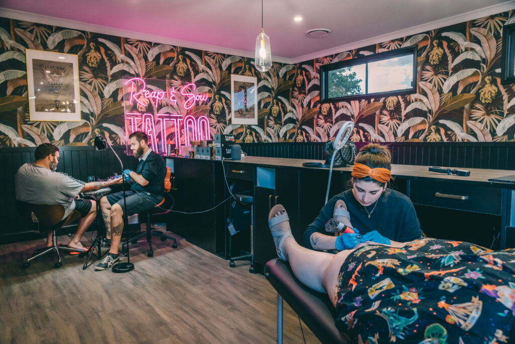 The tattooing area at Reap and Sow Tattoo, your destination for exceptional tattoos in Brisbane. Our skilled artists work in a clean and sterile environment to ensure your comfort and safety throughout the tattooing process.
